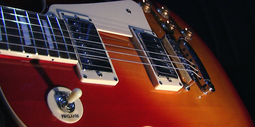 Guitar Điện Thân Đặc Và Bán Rỗng